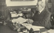 Sir Felix Schuster at his desk, 1930s